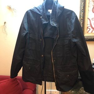 Waist length coat with lots of pockets